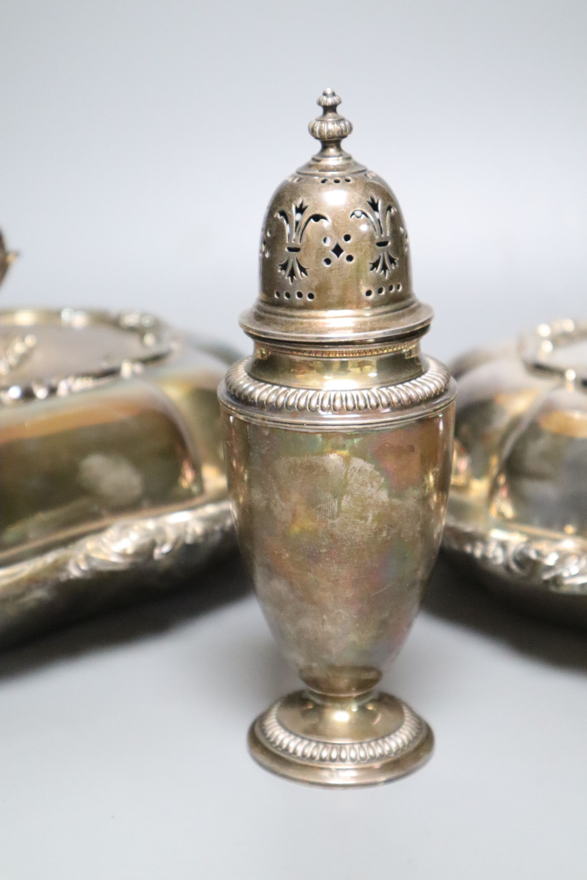 A pair of Victorian plated tureens and a plater sugar sifter